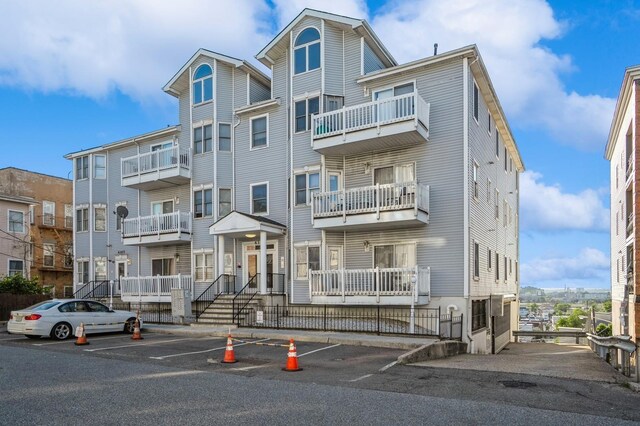 4313 Smith Ave Unit 10, North Bergen, NJ 07047 - view of apartment building / complex with uncovered parking