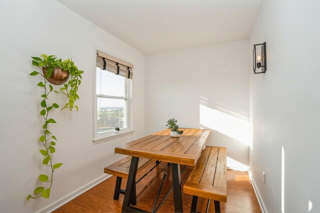 4313 Smith Ave Unit 10, North Bergen, NJ 07047 - dining space with baseboards and wood finished floors