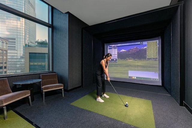 playroom with carpet and golf simulator