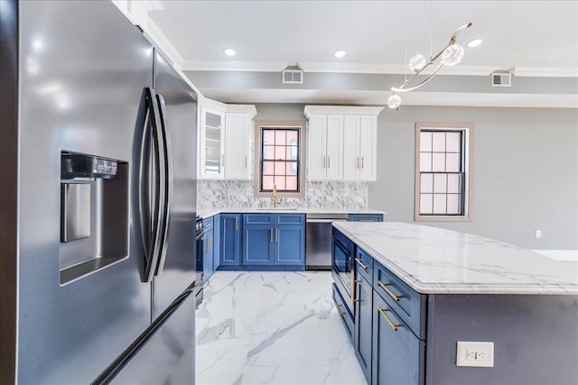 412 10th St Unit 2, Union City, NJ 07087 - kitchen with visible vents, stainless steel appliances, ornamental molding, and a sink