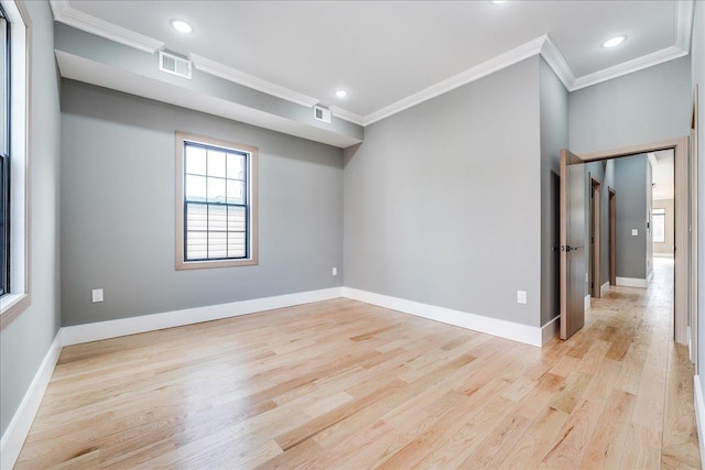 412 10th St Unit 2, Union City, NJ 07087 - empty room featuring visible vents, light wood-style flooring, and crown molding