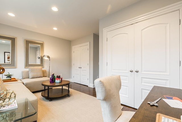 office with dark hardwood / wood-style floors