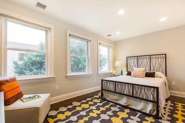 bedroom featuring dark wood-type flooring