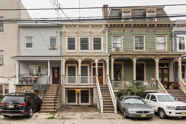 view of property featuring a porch