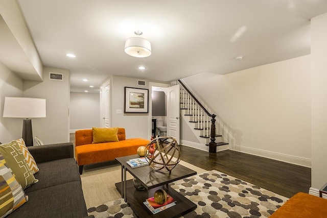 living room with dark wood-type flooring