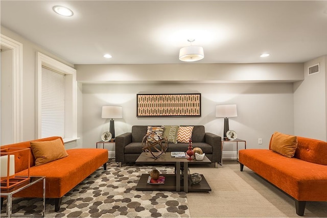 living room featuring light colored carpet