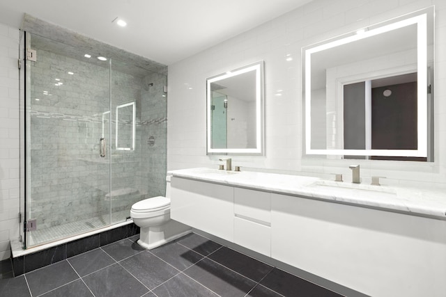 380 Mountain Rd Unit 1906-1907, Union City, NJ 07087 - bathroom with double vanity, tile patterned floors, a shower stall, and recessed lighting