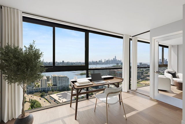 380 Mountain Rd Unit 1906-1907, Union City, NJ 07087 - sunroom / solarium with a skyline view and a water view