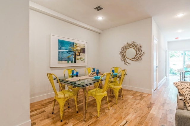 dining room with light hardwood / wood-style floors