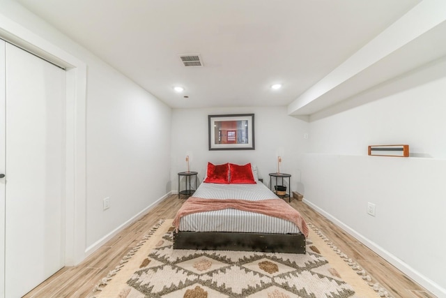 bedroom featuring hardwood / wood-style flooring