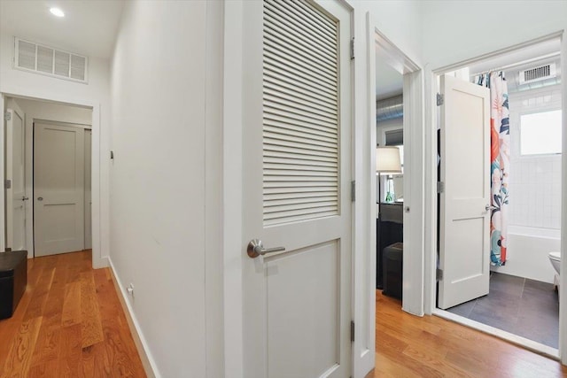 390 1st St Unit 2, Jersey City, NJ 07302 - hallway with light wood-type flooring and baseboards