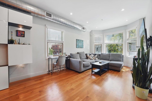 390 1st St Unit 2, Jersey City, NJ 07302 - living area with light wood-type flooring, baseboards, and recessed lighting