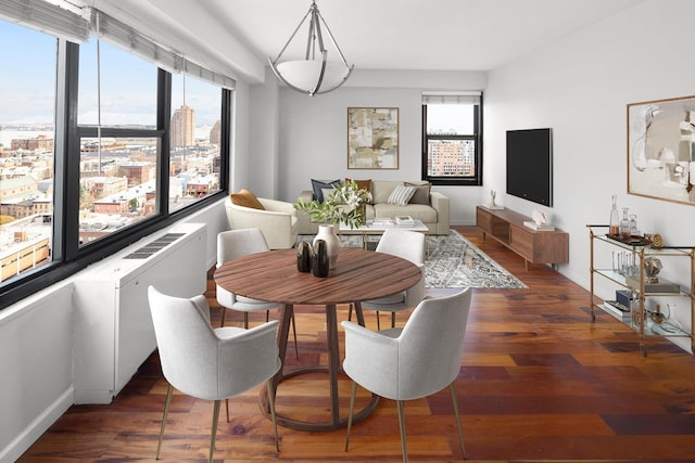 135 Montgomery St Unit A-19, Jersey City, NJ 07302 - dining area with wood finished floors and baseboards