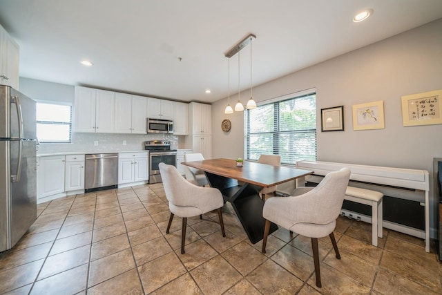 8915 Bergenwood Ave Unit 48, North Bergen, NJ 07047 - dining room with plenty of natural light and recessed lighting