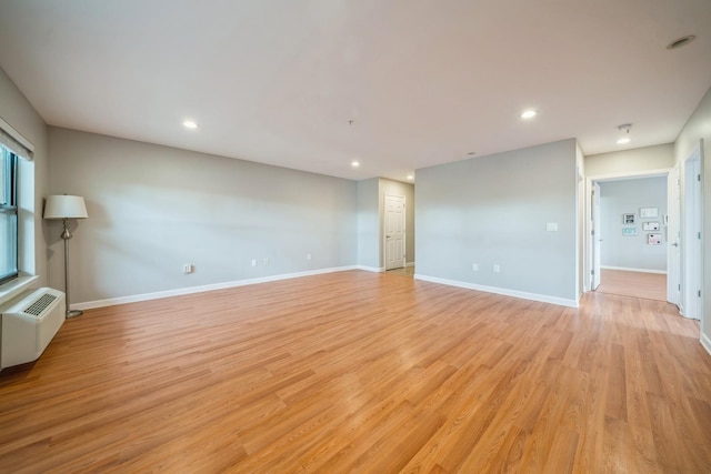 8915 Bergenwood Ave Unit 48, North Bergen, NJ 07047 - unfurnished room featuring light wood finished floors, recessed lighting, and baseboards