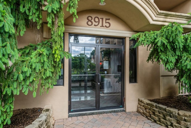 8915 Bergenwood Ave Unit 48, North Bergen, NJ 07047 - property entrance featuring stucco siding and french doors