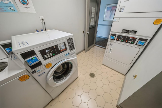 8915 Bergenwood Ave Unit 48, North Bergen, NJ 07047 - shared laundry room featuring stacked washing machine and dryer, light tile patterned floors, and independent washer and dryer