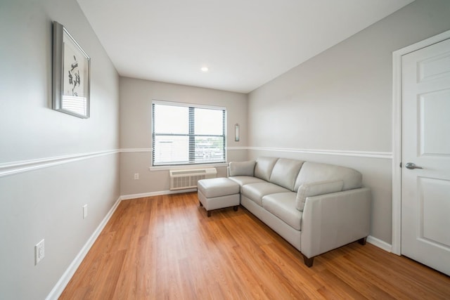 8915 Bergenwood Ave Unit 48, North Bergen, NJ 07047 - living room featuring light wood finished floors, baseboards, a wall mounted AC, and recessed lighting