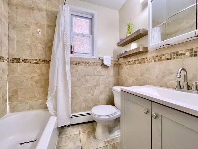 bathroom featuring vanity, tile walls, tile patterned floors, toilet, and a baseboard radiator