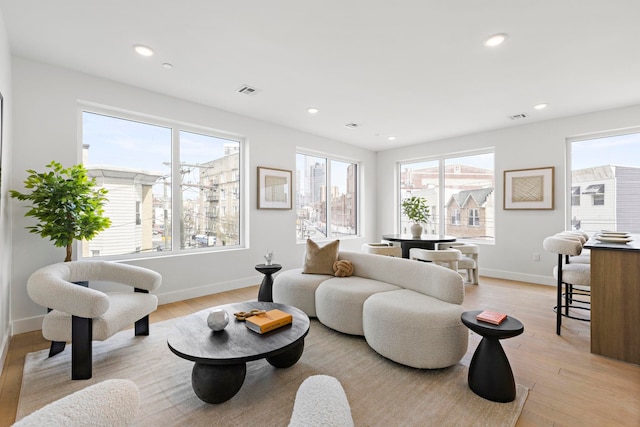 35 Orchard St Unit 301, Jersey City, NJ 07306 - living room with recessed lighting, baseboards, and light wood finished floors