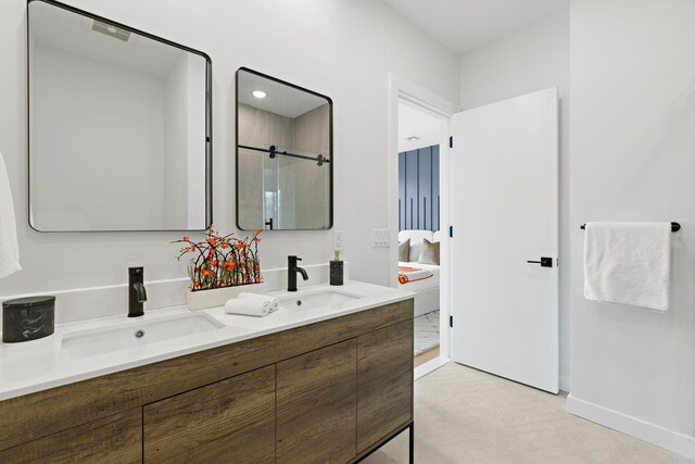 35 Orchard St Unit 301, Jersey City, NJ 07306 - bathroom with double vanity, a sink, and walk in shower