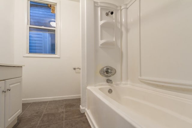 12 W 31st St, Bayonne, NJ 07002 - full bathroom with baseboards, bathtub / shower combination, vanity, and tile patterned flooring