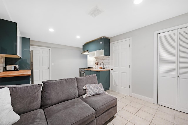 4 Sherman Ave Unit 1, Jersey City, NJ 07307 - living area with light tile patterned floors and recessed lighting