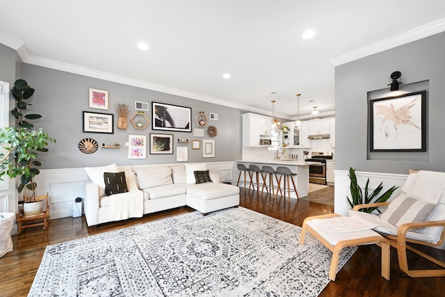 4 Sherman Ave Unit 1, Jersey City, NJ 07307 - living room with wood finished floors, crown molding, wainscoting, and recessed lighting