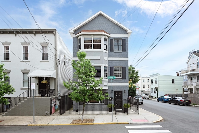 4 Sherman Ave Unit 1, Jersey City, NJ 07307 - view of property featuring brick siding
