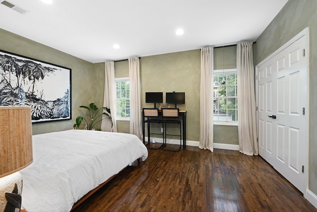 4 Sherman Ave Unit 1, Jersey City, NJ 07307 - bedroom with wood finished floors, multiple windows, and recessed lighting