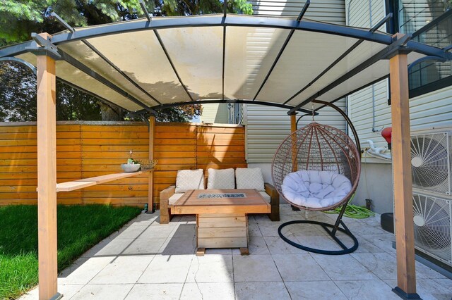 2505 Palisade Ave, Union City, NJ 07087 - view of patio featuring an outdoor hangout area, fence, and ac unit