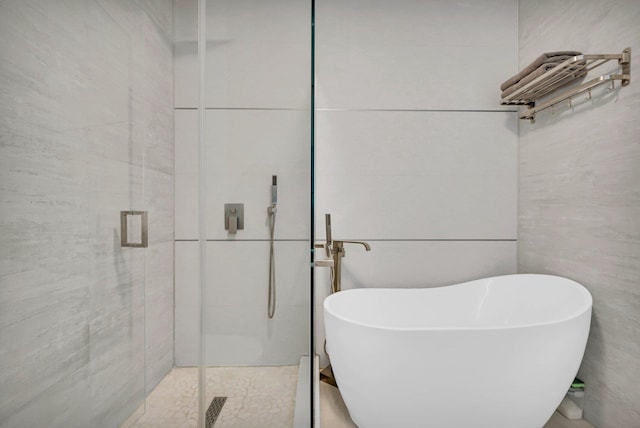 2505 Palisade Ave, Union City, NJ 07087 - bathroom featuring a shower stall and a soaking tub