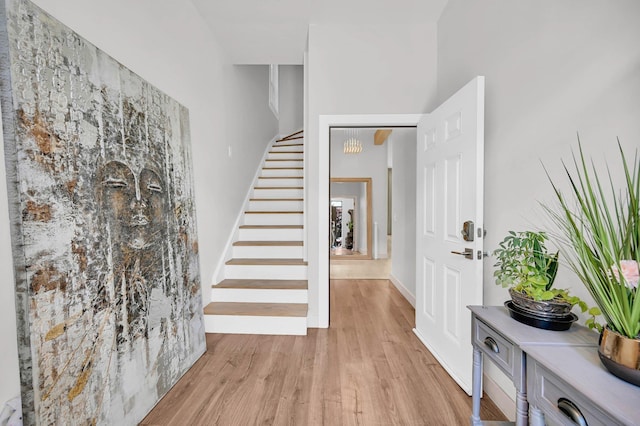 2505 Palisade Ave, Union City, NJ 07087 - foyer featuring stairway, light wood finished floors, and baseboards