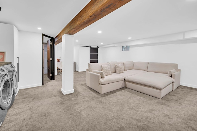 2505 Palisade Ave, Union City, NJ 07087 - carpeted living area with separate washer and dryer, a barn door, recessed lighting, and baseboards