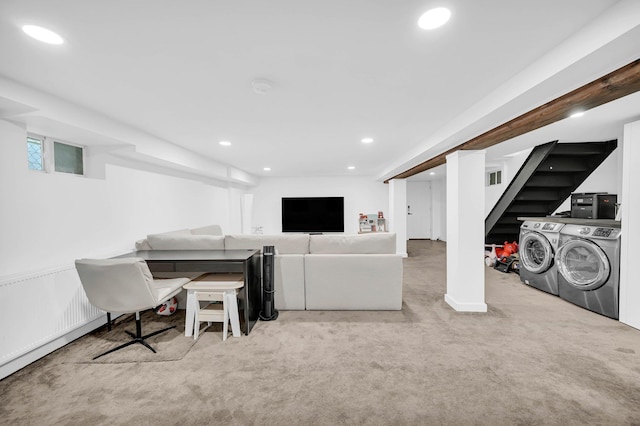 2505 Palisade Ave, Union City, NJ 07087 - carpeted living area with washing machine and clothes dryer, recessed lighting, and stairway