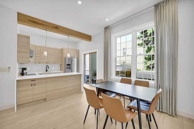 2505 Palisade Ave, Union City, NJ 07087 - dining space featuring beam ceiling, light wood-style floors, recessed lighting, and baseboards