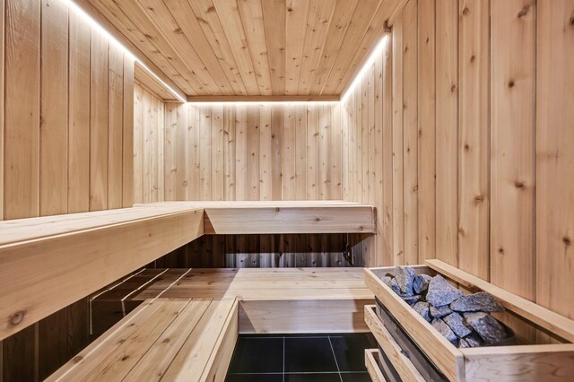 2505 Palisade Ave, Union City, NJ 07087 - sauna / steam room with wooden walls, wood ceiling, and tile patterned floors