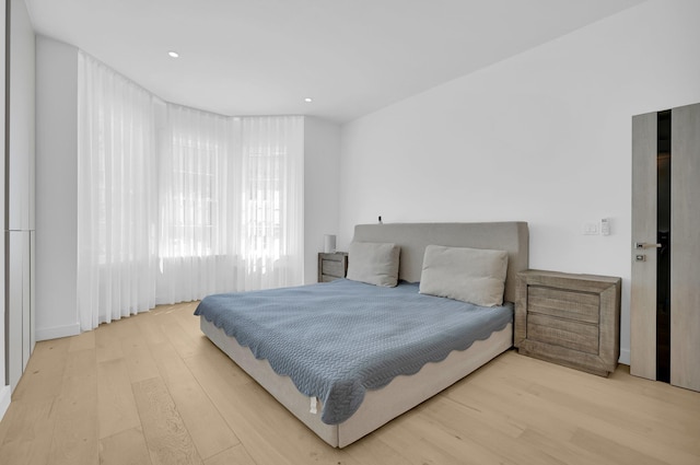 2505 Palisade Ave, Union City, NJ 07087 - bedroom with wood finished floors and recessed lighting