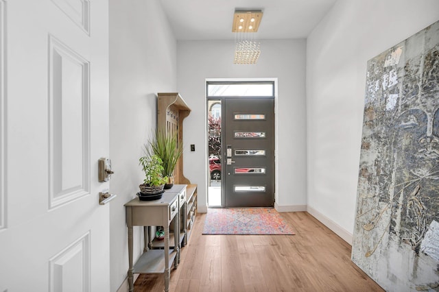 2505 Palisade Ave, Union City, NJ 07087 - foyer with light wood-style floors and baseboards