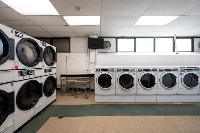 135 Montgomery St Unit 6D, Jersey City, NJ 07302 - shared laundry room featuring stacked washer / drying machine and washing machine and clothes dryer