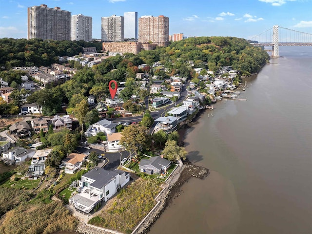 drone / aerial view with a water view