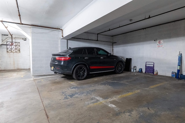 327 71st St Unit 1E, Guttenberg, NJ 07093 - parking deck with concrete block wall