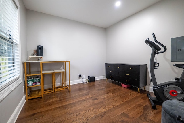 327 71st St Unit 1E, Guttenberg, NJ 07093 - miscellaneous room with electric panel, plenty of natural light, wood finished floors, and baseboards