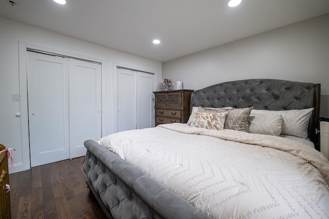 327 71st St Unit 1E, Guttenberg, NJ 07093 - bedroom featuring multiple closets, dark wood finished floors, and recessed lighting