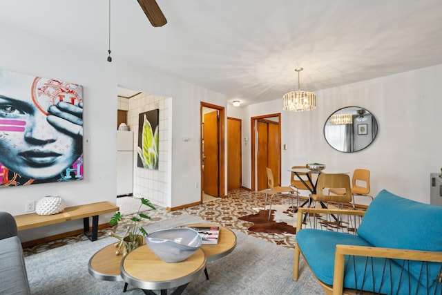 914 Washington St, Hoboken, NJ 07030 - living area with a chandelier, carpet flooring, and a ceiling fan