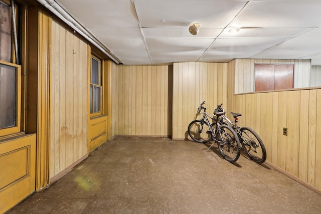 914 Washington St, Hoboken, NJ 07030 - finished basement featuring tile patterned floors and wood walls