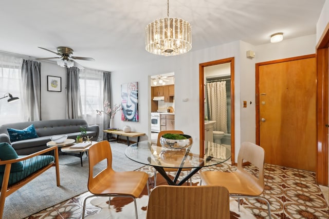 914 Washington St, Hoboken, NJ 07030 - dining area featuring a ceiling fan and a chandelier