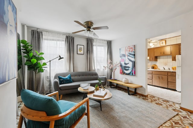 914 Washington St, Hoboken, NJ 07030 - living room with a ceiling fan and baseboards