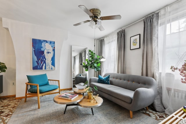 914 Washington St, Hoboken, NJ 07030 - living area featuring a ceiling fan and baseboards