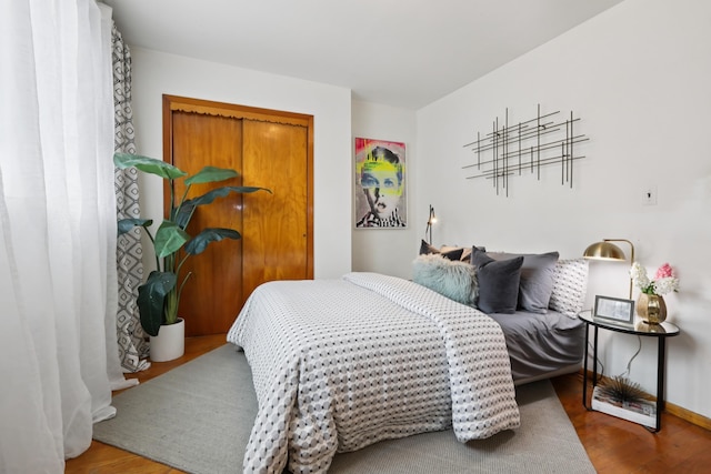 914 Washington St, Hoboken, NJ 07030 - bedroom with wood finished floors and baseboards